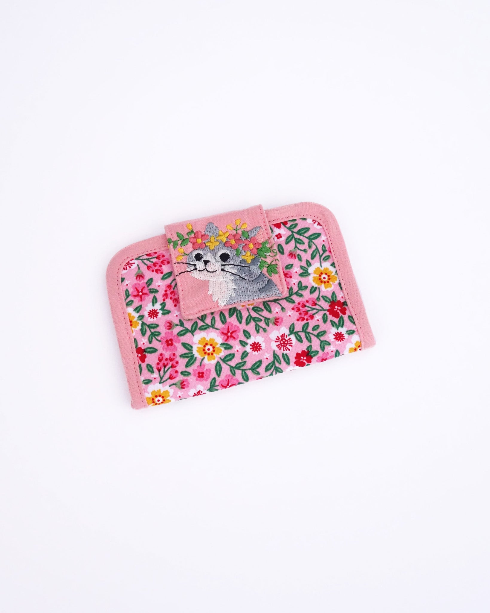 Cat Card-Case in pink blossoms with cat appliqué, embroidery detail and Velcro flap closure in front view.