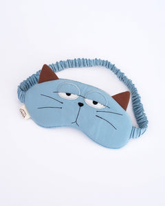 Cat eye mask in blue color with appliqué, embroidery, 3D cat ears, elastic strap, foam-padding, in front view.