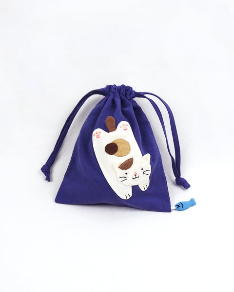 Cat Pouch in purple with cat appliqué, embroidery detail, two-sided drawstring enclosure, small blue fish hanging at the bottom right corner.